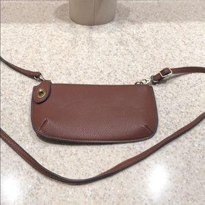 Mini cross body bag.